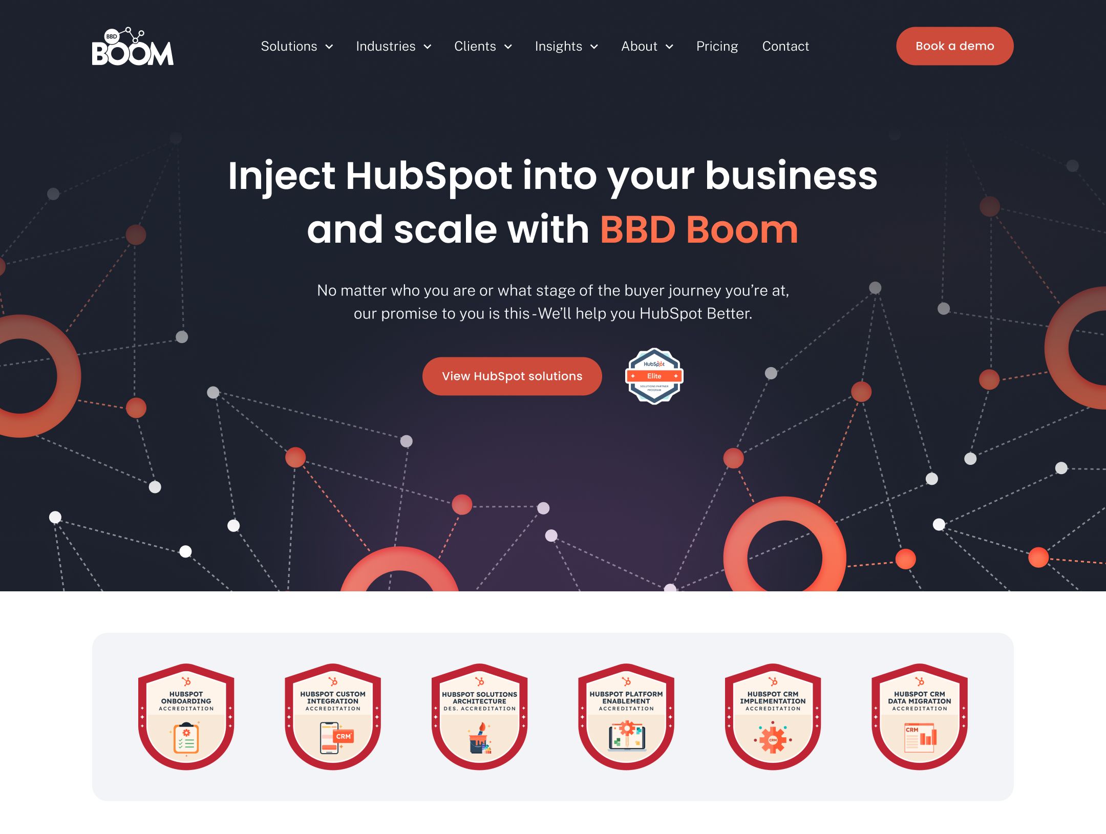 BBD Boom's homepage displays a dark-themed hero section promoting HubSpot integration services with six red-shielded certification badges below.