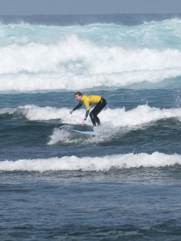 Sarah surfing.